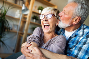 Senior couple hugging and kissing