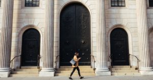 Woman walking on a sidewalk