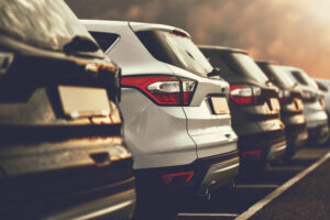 SUVs parked in a car dealership.